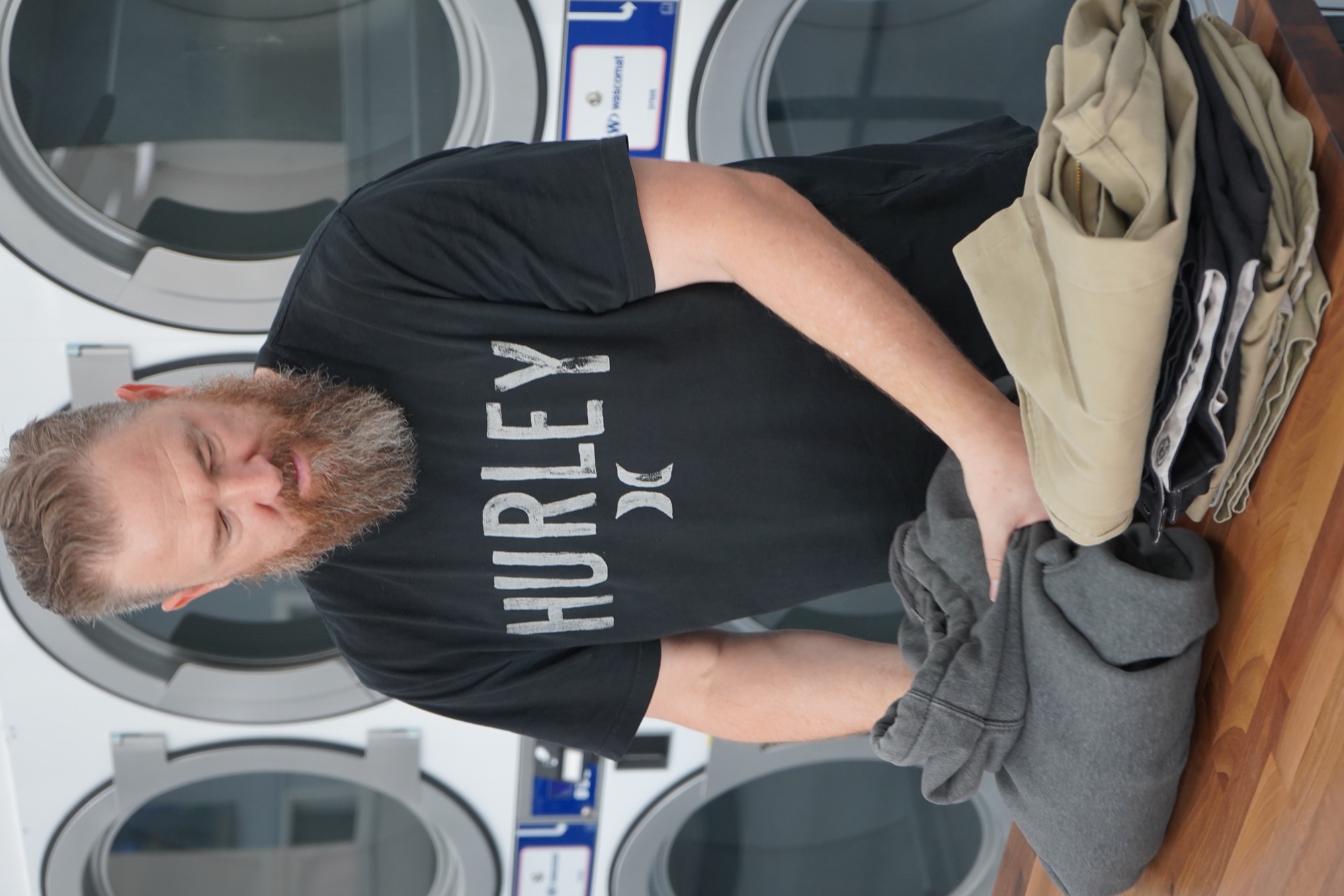 Neatly folded wash & fold laundry from PureSpin